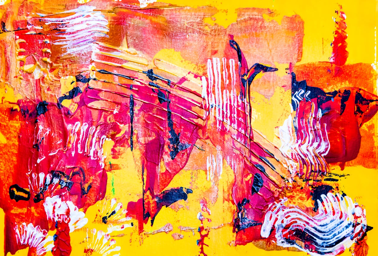 Dynamic abstract painting with vivid red, yellow, and white tones, showcasing expressive strokes.